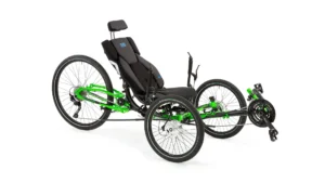 ICE Adventure: Recumbent Trike 3 Accessible green and black recumbent tricycle with padded seat, ideal for disabled outdoor cycling at our not-for-profit CIC events.